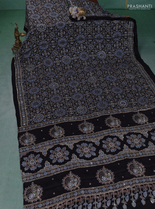 Modal silk saree black with allover ajrakh prints & sequin work and mirror sequin work pallu