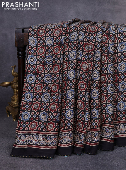 Modal silk saree black with allover ajrakh prints & sequin work and sequin work pallu