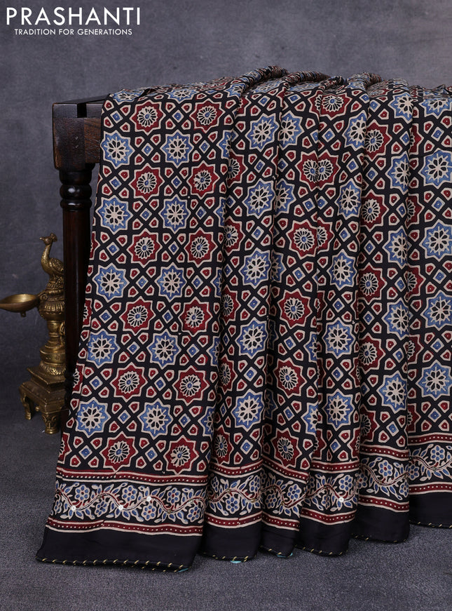 Modal silk saree black with allover ajrakh prints & sequin work and sequin work pallu