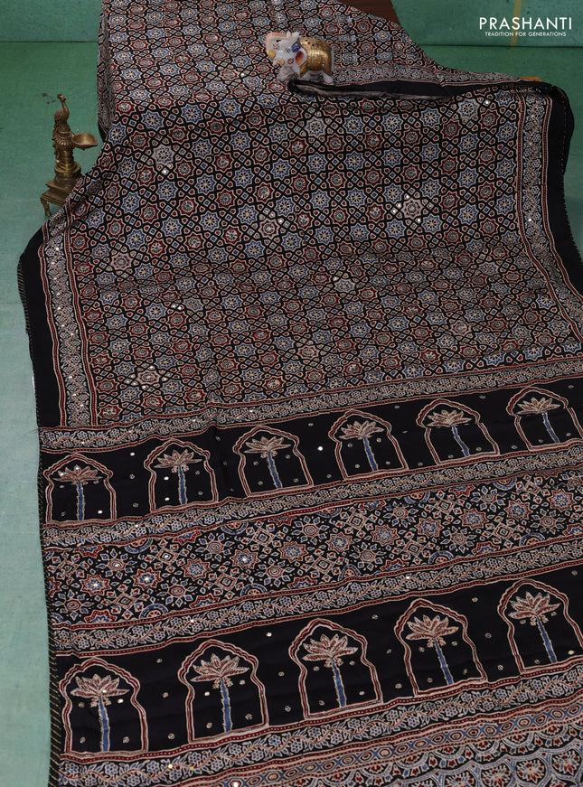 Modal silk saree black with allover ajrakh prints & sequin work and sequin work pallu