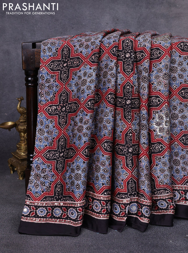 Modal silk saree black with allover ajrakh prints & sequin work and mirror sequin work pallu