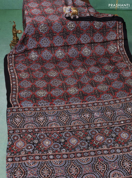Modal silk saree black with allover ajrakh prints & sequin work and mirror sequin work pallu