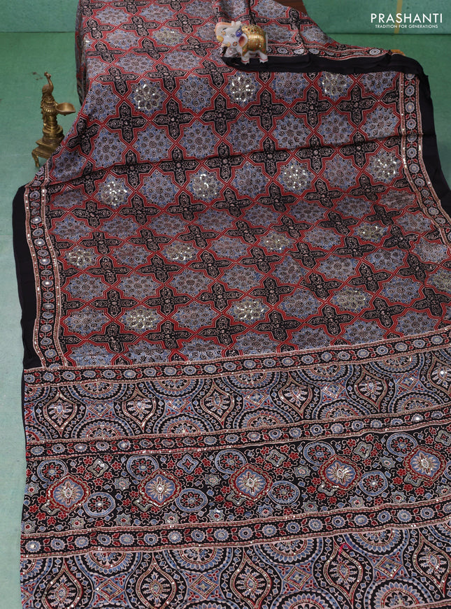 Modal silk saree black with allover ajrakh prints & sequin work and mirror sequin work pallu