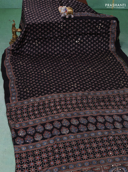 Modal silk saree black with allover ajrakh butta prints & sequin work and mirror sequin work pallu