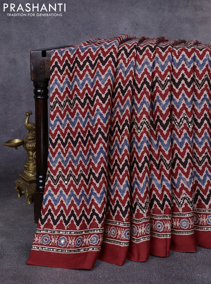 Modal silk saree maroon with allover zigzag ajrakh prints & sequin work and mirror sequin work pallu