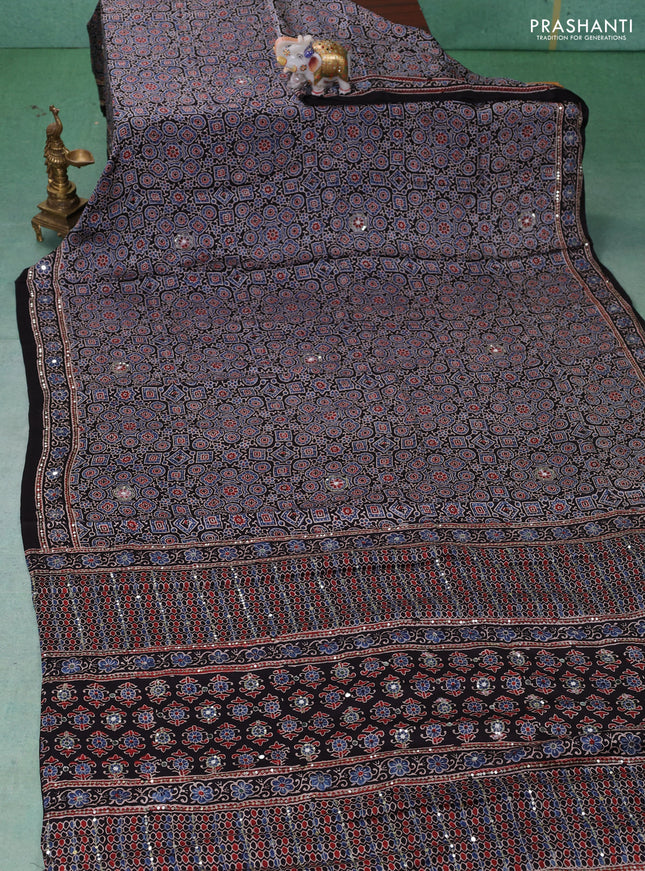 Modal silk saree black with allover ajrakh prints & sequin work and mirror sequin work pallu