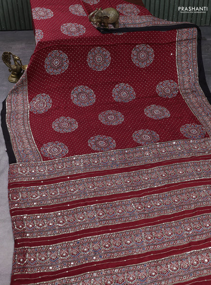 Modal silk saree maroon and black with allover ajrakh prints & sequin work and mirror sequin work pallu