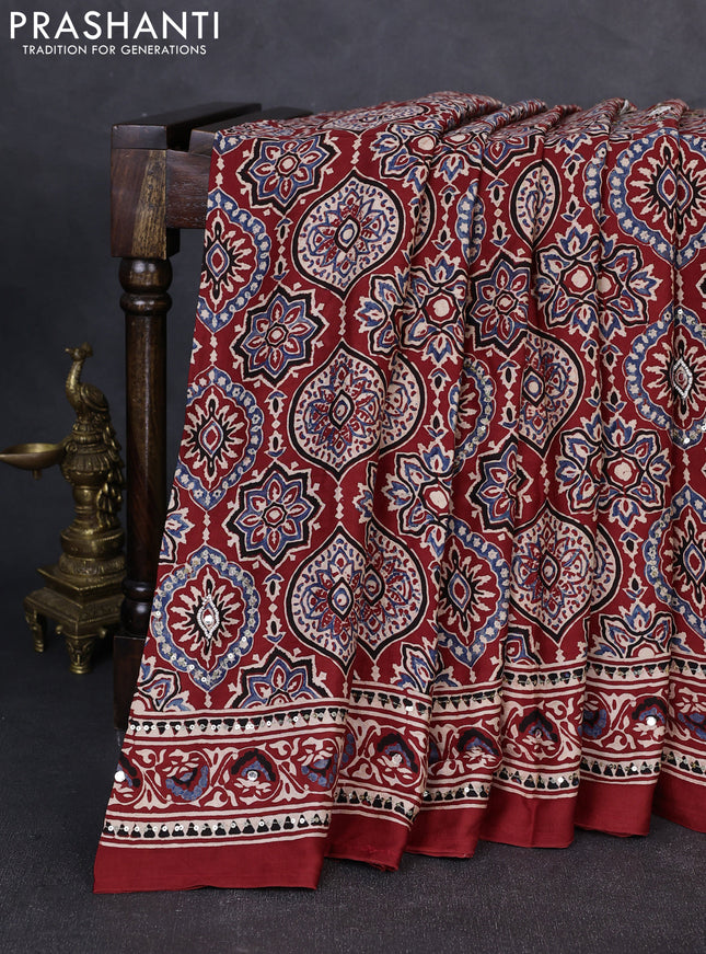 Modal silk saree maroon with allover ajrakh prints & sequin work and mirror sequin work pallu