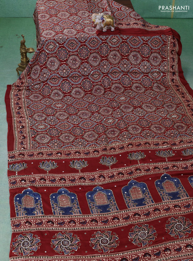 Modal silk saree maroon with allover ajrakh prints & sequin work and mirror sequin work pallu