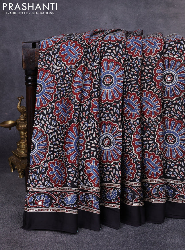 Modal silk saree black with allover ajrakh prints & sequin work and mirror sequin work pallu