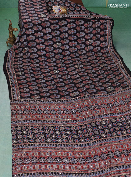 Modal silk saree black with allover ajrakh prints & sequin work and mirror sequin work pallu