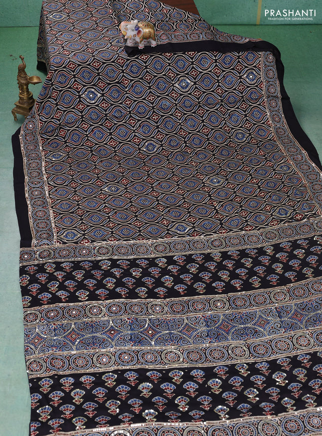 Modal silk saree black with allover ajrakh prints & sequin work and mirror sequin work pallu