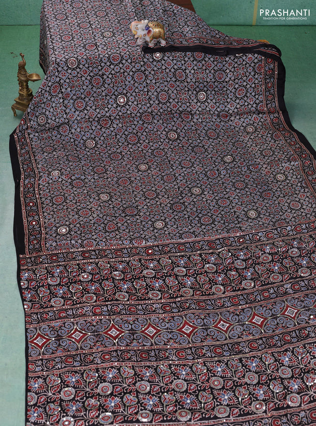 Modal silk saree black with allover ajrakh prints & sequin work and mirror sequin work pallu