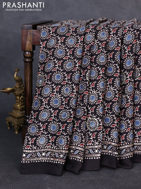 Modal silk saree black with allover ajrakh prints & sequin work and mirror sequin work pallu