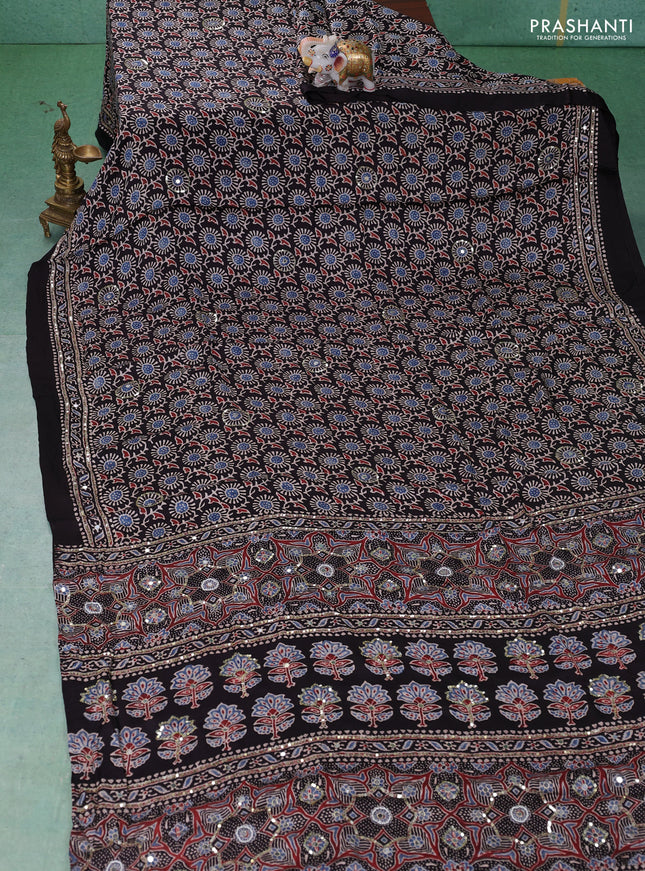 Modal silk saree black with allover ajrakh prints & sequin work and mirror sequin work pallu