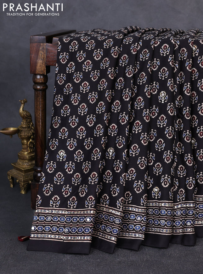 Modal silk saree black with allover ajrakh prints & sequin work and mirror sequin work pallu