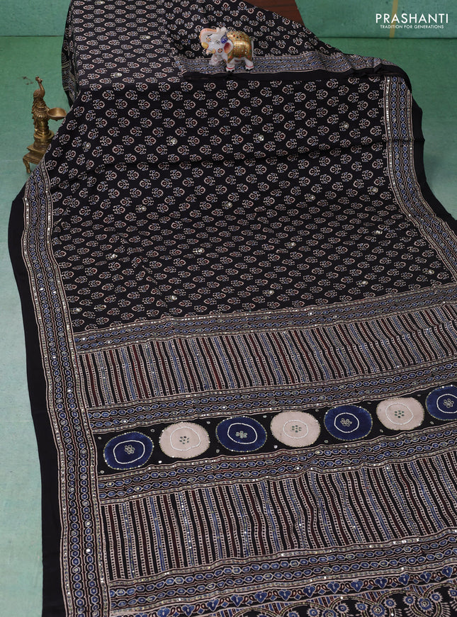 Modal silk saree black with allover ajrakh prints & sequin work and mirror sequin work pallu