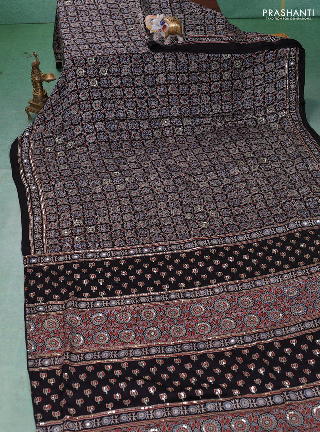 Modal silk saree black with allover ajrakh prints & sequin work and mirror sequin work pallu