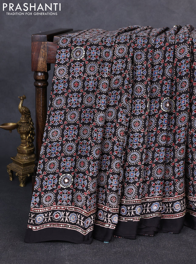 Modal silk saree black with allover ajrakh prints & sequin work and mirror sequin work pallu