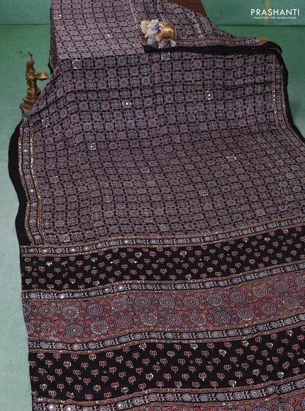Modal silk saree black with allover ajrakh prints & sequin work and mirror sequin work pallu