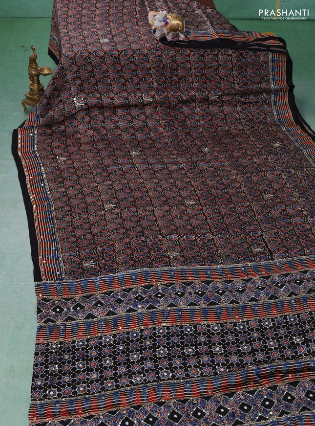 Modal silk saree black with allover ajrakh prints & sequin work and mirror sequin work pallu