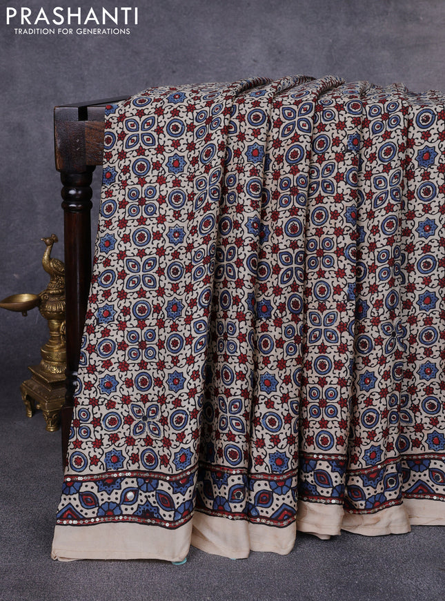 Modal silk saree beige with allover ajrakh prints & sequin work and mirror sequin work pallu