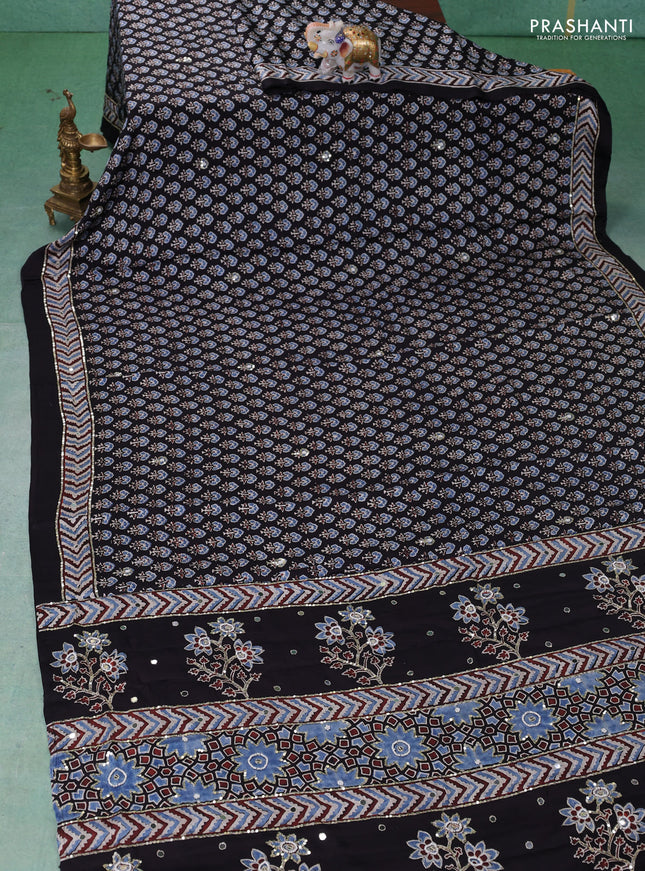 Modal silk saree black with allover ajrakh prints & sequin work and mirror sequin work pallu