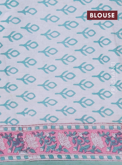 Jaipur cotton saree teal green and light pink with allover floral prints and printed border