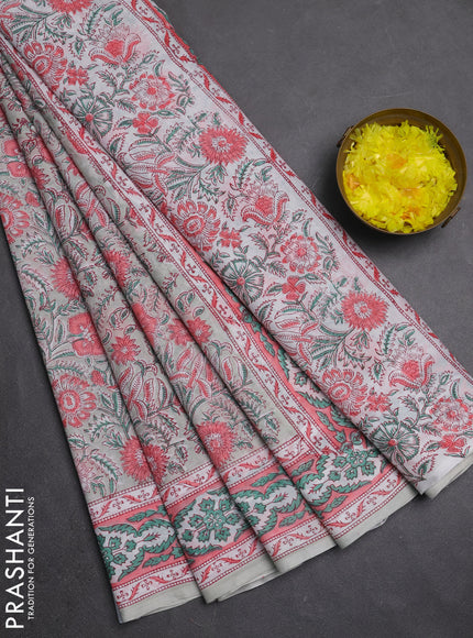 Jaipur cotton saree pastel green and peach with allover floral prints and printed border