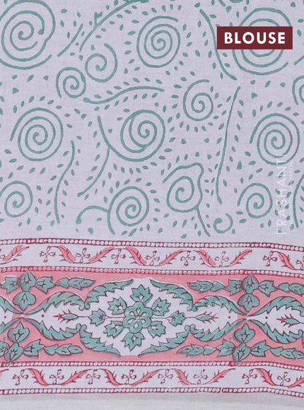 Jaipur cotton saree pastel green and peach with allover floral prints and printed border