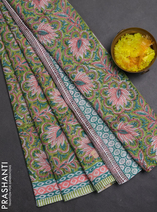 Jaipur cotton saree light green and peach with allover floral prints and printed border