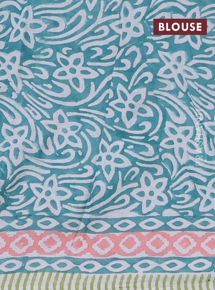 Jaipur cotton saree light green and peach with allover floral prints and printed border