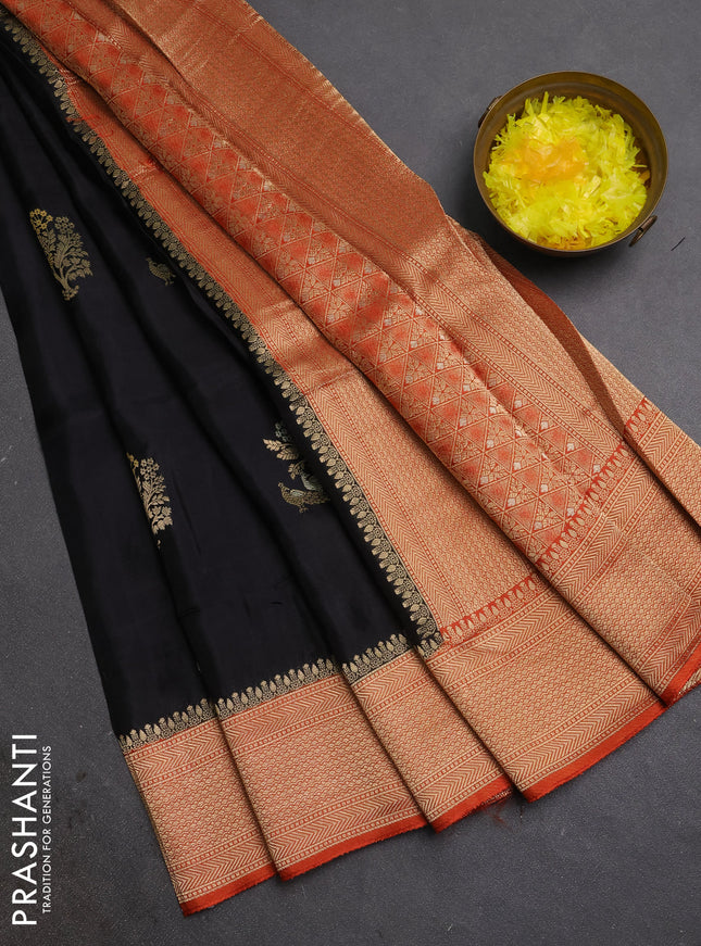 Semi mysore silk saree black and rustic orange with zari woven buttas and zari woven border