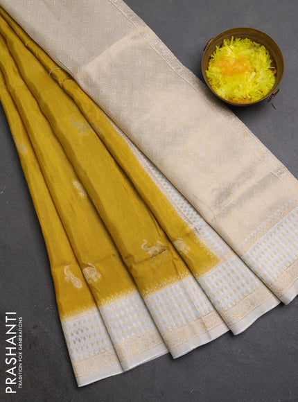 Semi mysore silk saree mustard yellow and cream with allover zari woven buttas and zari woven border