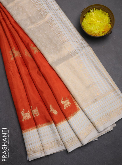 Semi mysore silk saree rust shade and cream with allover zari woven buttas and zari woven border