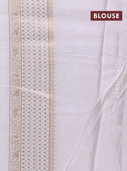 Semi mysore silk saree rust shade and cream with allover zari woven buttas and zari woven border