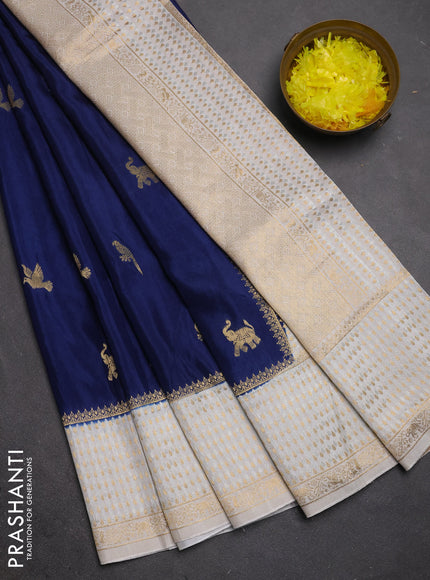 Semi mysore silk saree peacock blue and cream with allover zari woven buttas and zari woven border