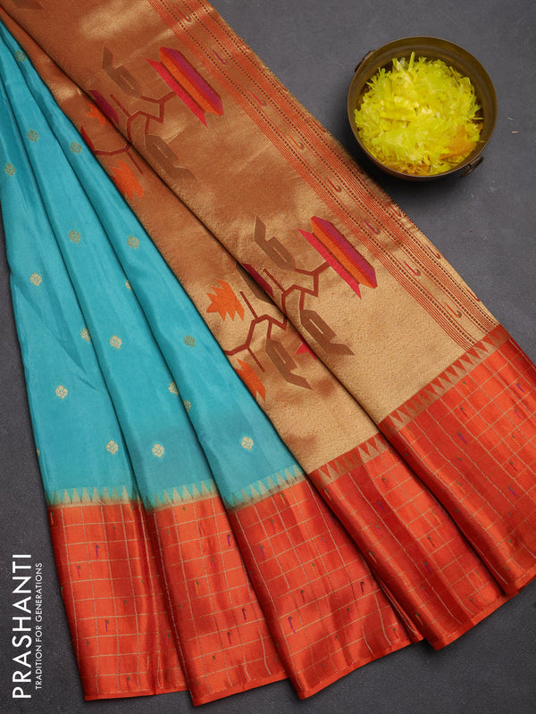 Semi mysore silk saree teal green and orange allover zari woven buttas and zari checks muniya butta border