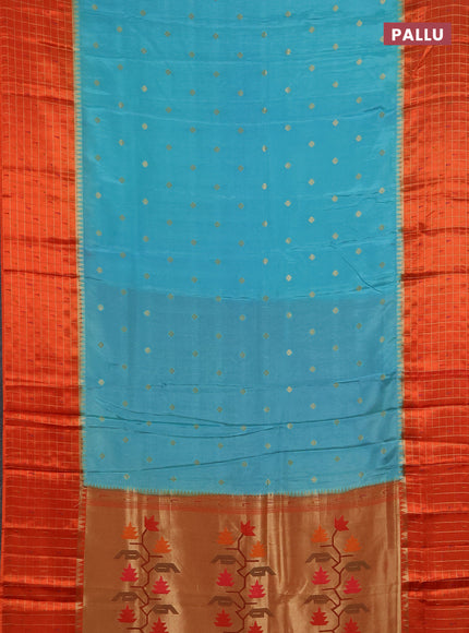 Semi mysore silk saree teal green and orange allover zari woven buttas and zari checks muniya butta border