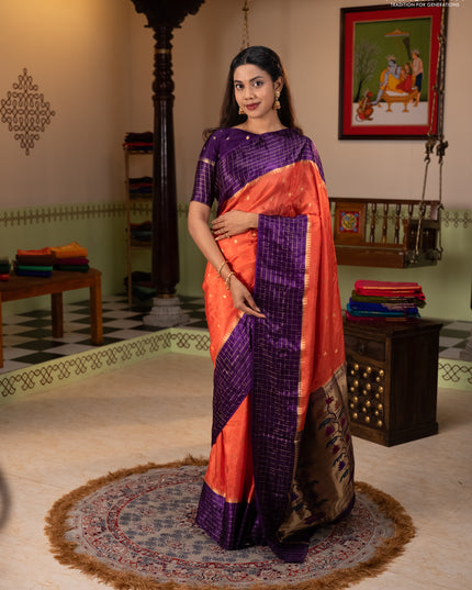 Semi mysore silk saree orange and purple allover zari woven buttas and zari checks muniya butta border