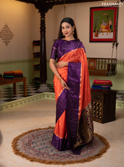 Semi mysore silk saree orange and purple allover zari woven buttas and zari checks muniya butta border
