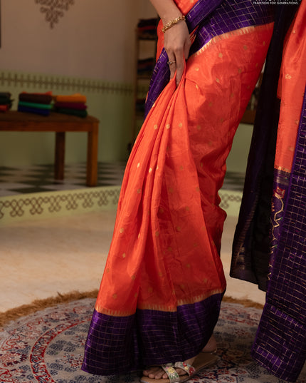 Semi mysore silk saree orange and purple allover zari woven buttas and zari checks muniya butta border