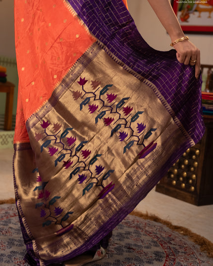 Semi mysore silk saree orange and purple allover zari woven buttas and zari checks muniya butta border