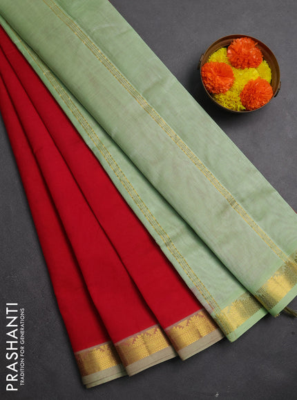 Silk cotton saree maroon and pista green with plain body and temple zari woven border