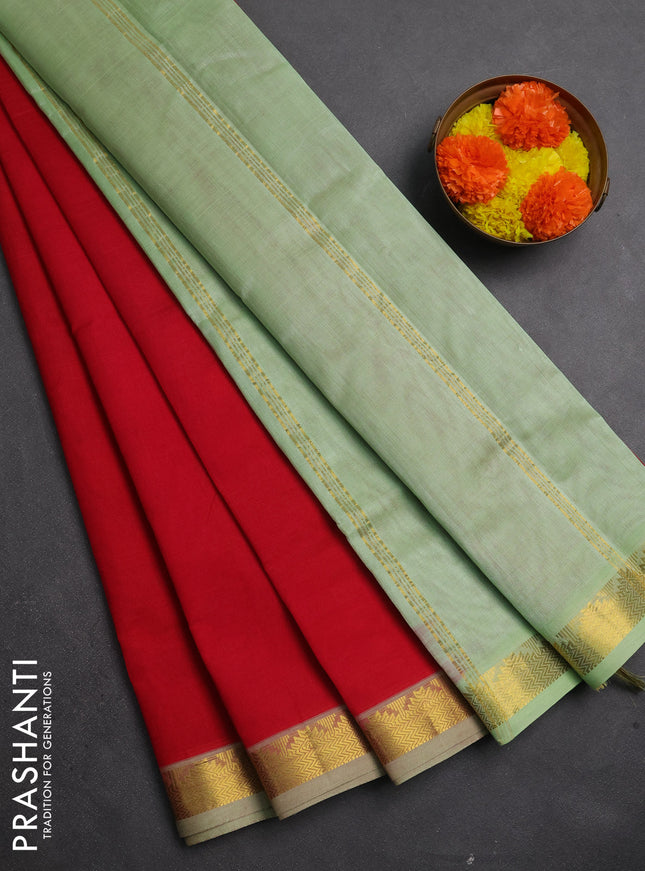 Silk cotton saree maroon and pista green with plain body and temple zari woven border