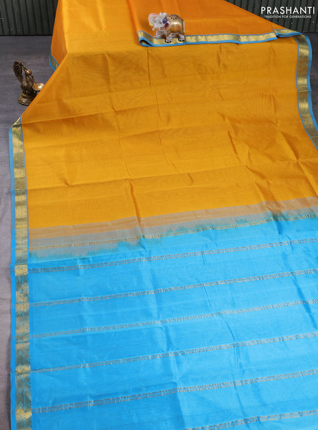 Silk cotton saree mustard yellow and cs blue with plain body and zari woven border