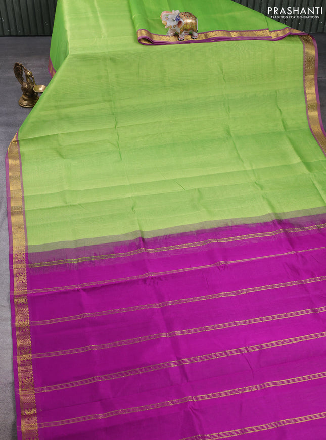 Silk cotton saree light green and purple with plain body and zari woven border