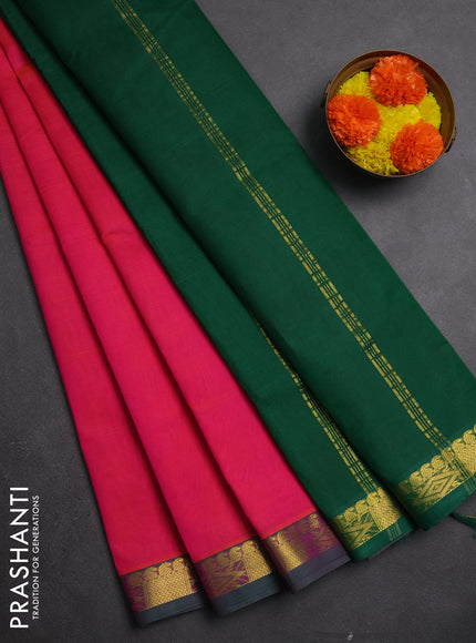 Silk cotton saree candy pink and green with plain body and zari woven border