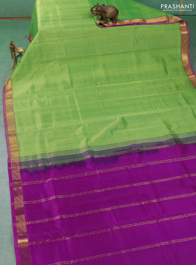 Silk cotton saree light green and purple with plain body and zari woven border