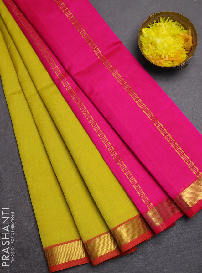 Silk cotton saree lime green and pink with plain body and zari woven border
